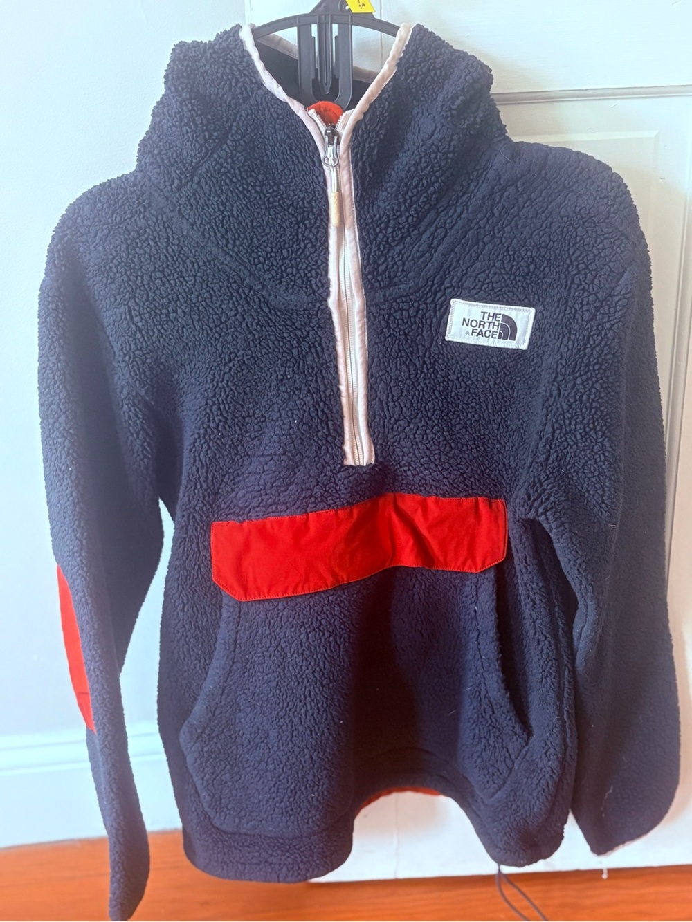 The North Face Mens Navy Sherpa Pullover Jacket with Red Accents